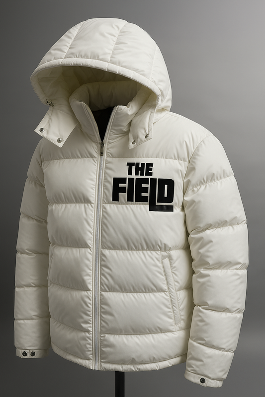White puffer jacket with 'The Field' logo on a gray background